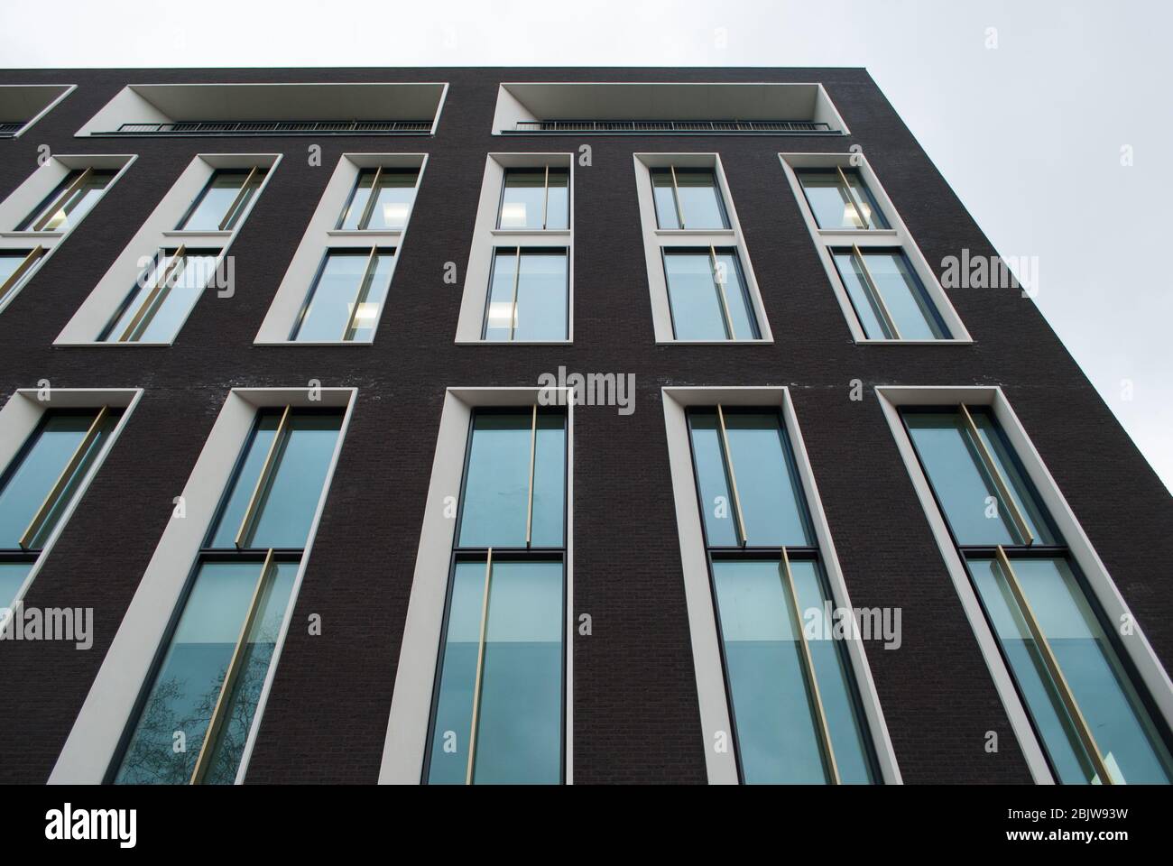 2010s Architecture Grey Brick Narrow Windows Deep Window Reveals Marble  5 Hanover Square, Mayfair, London W1S by Squire & Partners Stock Photo