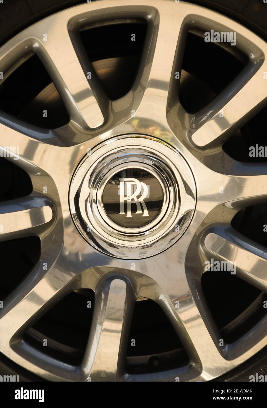 LONDON, ENGLAND - JULY 2018: Close up view of the wheel trim on a luxury Rolls Royce car Stock Photo