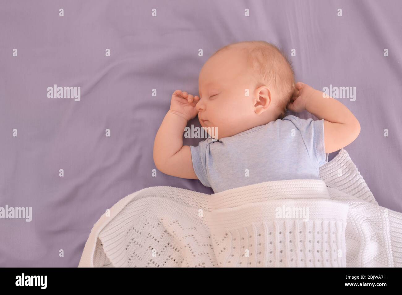 Cute little baby sleeping on bed Stock Photo Alamy