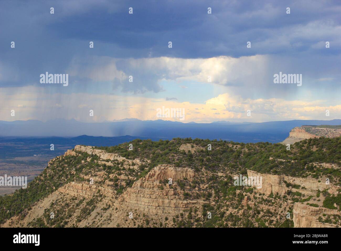 Rainstorm in the distance at Mesa Verde National Park Stock Photo