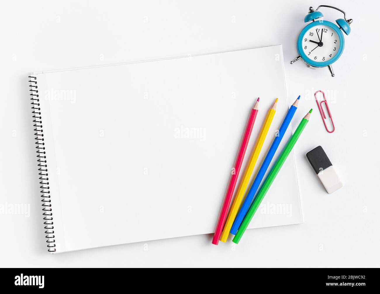 Download Workspace With School Supplies Sketchbook Mockup Colorful Pencils And Clock Flat Lay Copy Space Stock Photo Alamy