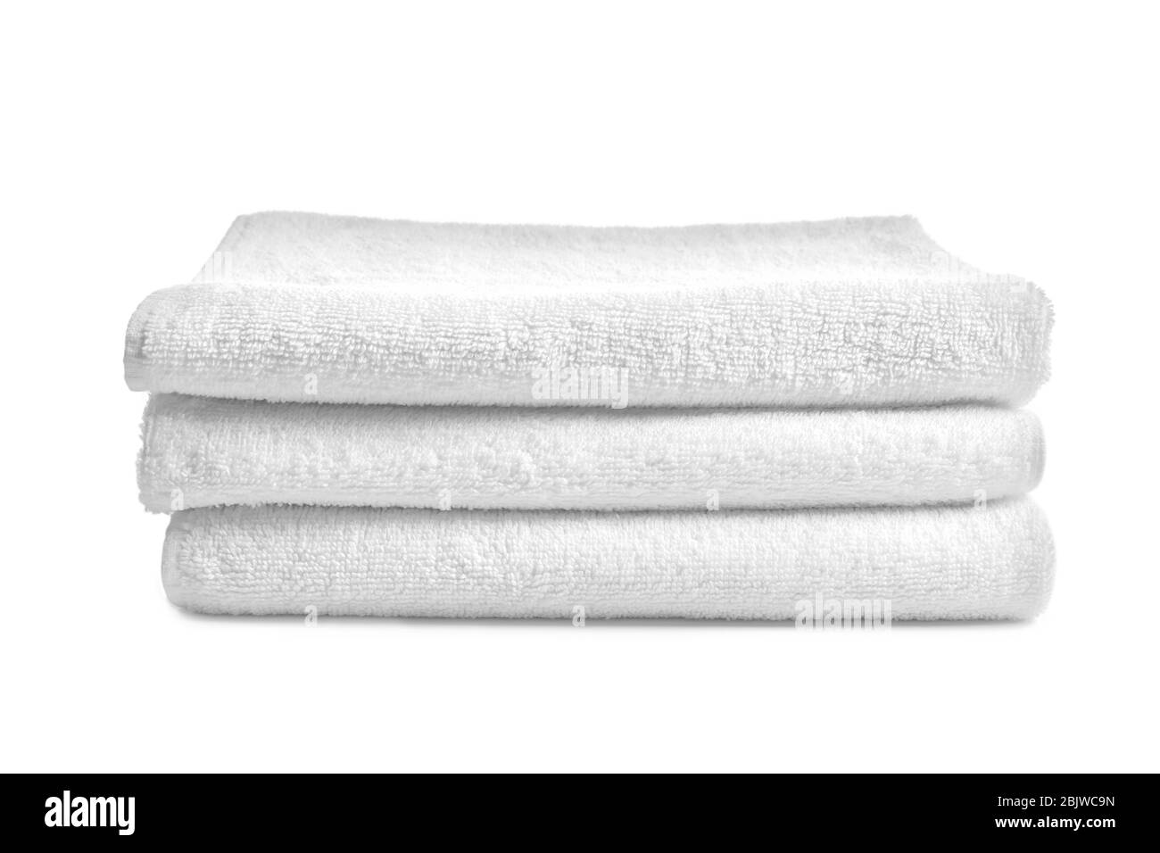 Folded clean terry towels on white background Stock Photo Alamy
