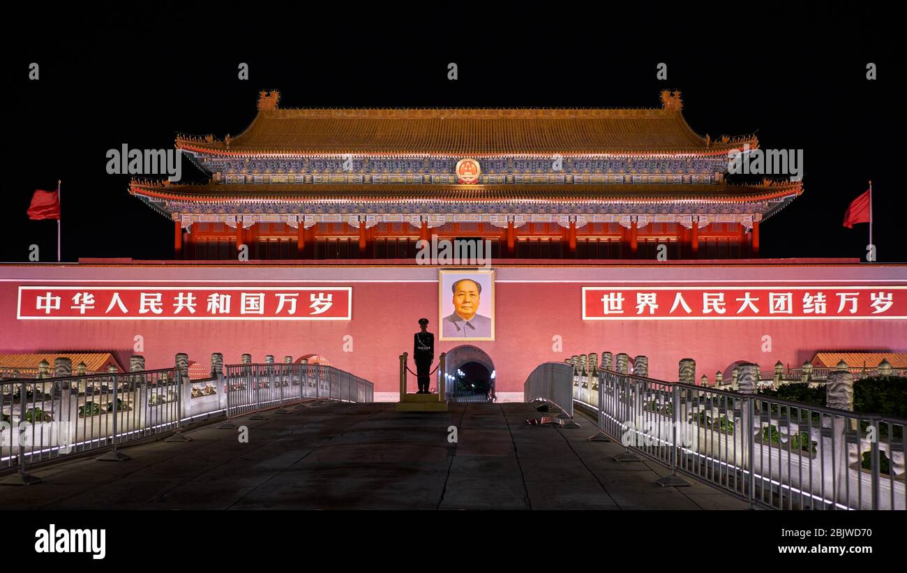 Beijing / China - October 10, 2018: Silhouette of a Chinese soldier standing guard in front of the portrait of Mao Zedong at Tiananmen Square in Beiji Stock Photo