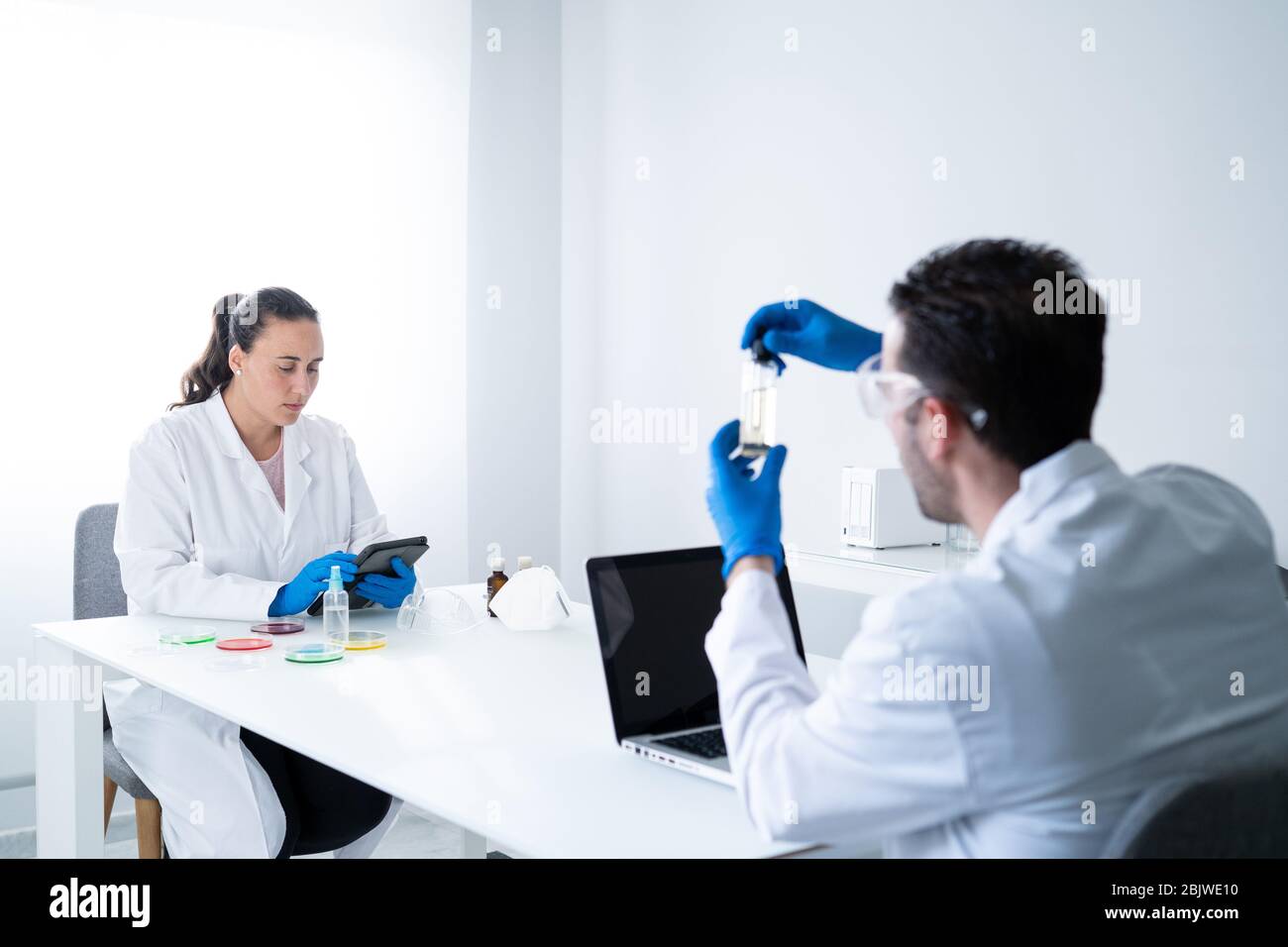 Young scientists or researchers working in modern biological science laboratory.The researcher is analyzing the medicine related innovation. Bio chemi Stock Photo