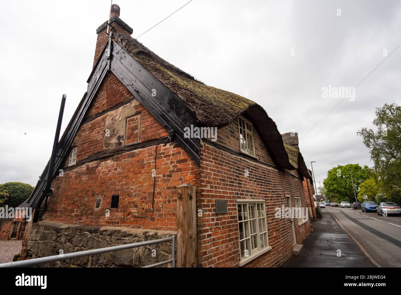 Example of a thatched roof village house Stock Photo Alamy