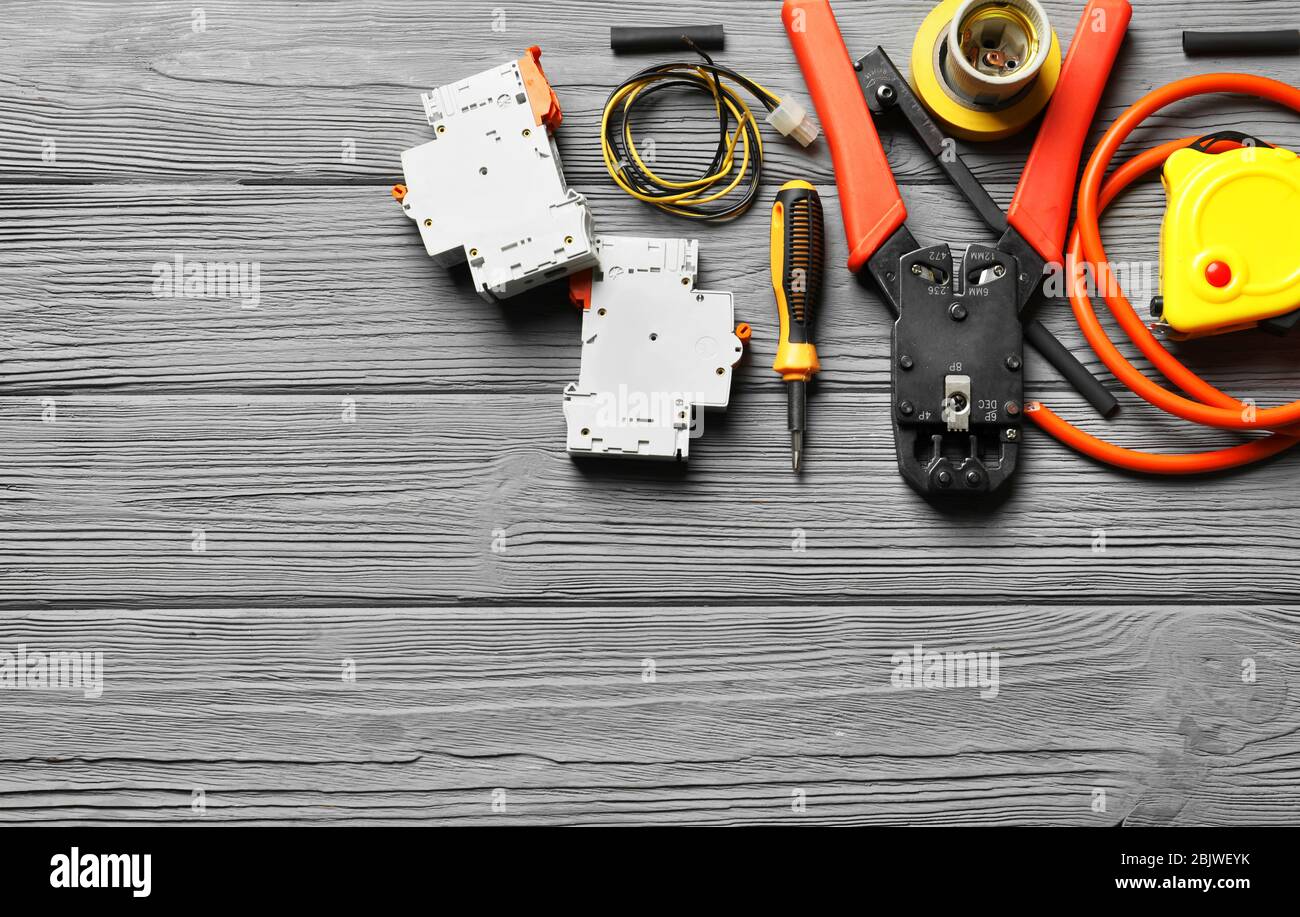 Different electrical tools on wooden background Stock Photo - Alamy Different electrical tools on wooden background Stock Photo - Alamy