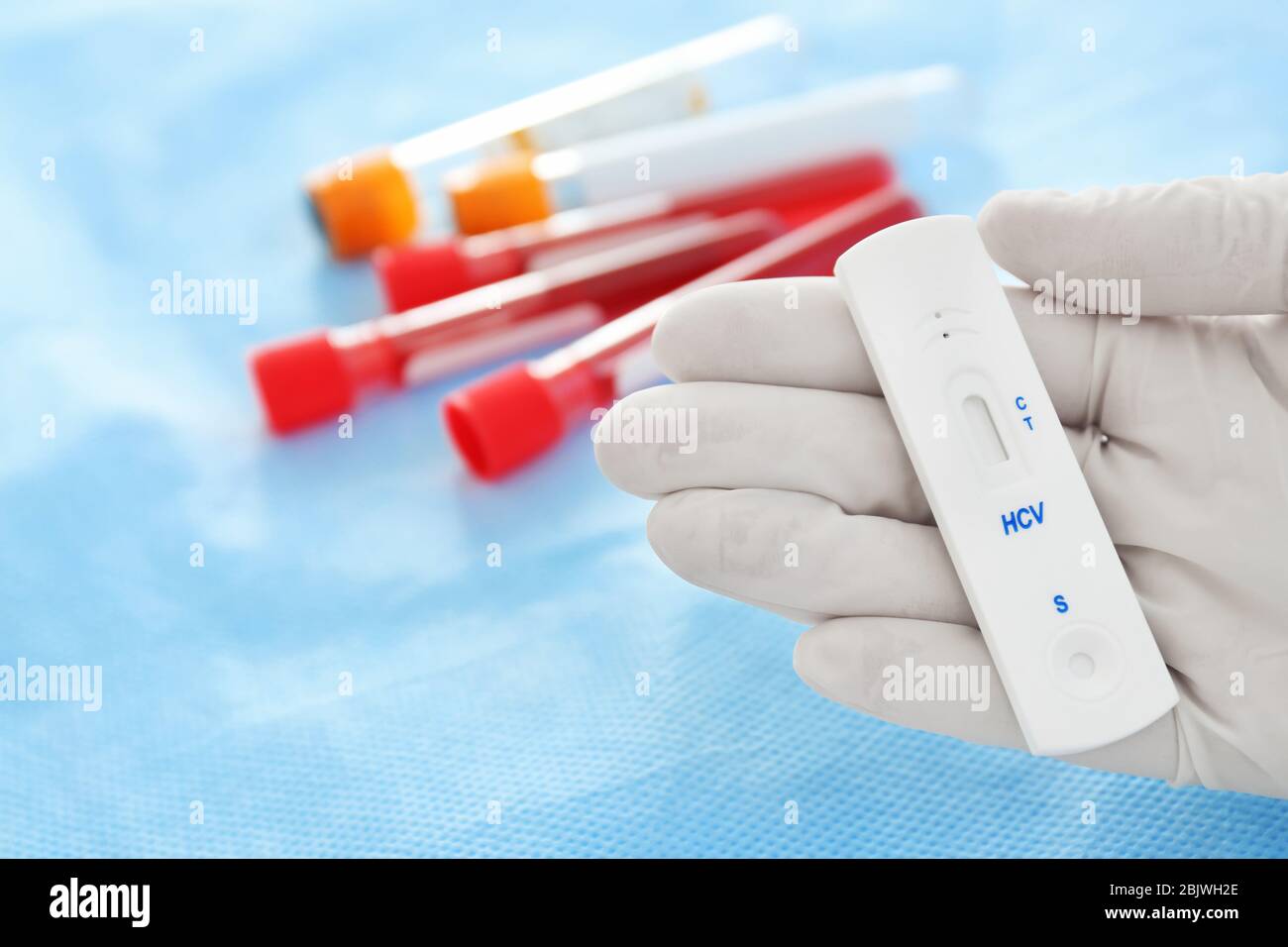 Doctor holding express test for HCV, closeup Stock Photo - Alamy