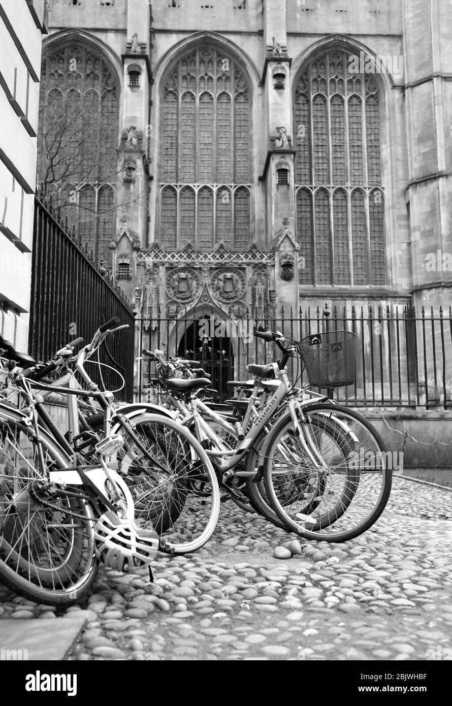March 2018 - Bikes stacked outside the side gates of The chapel of Kings College, Cambridge. UK. Stock Photo