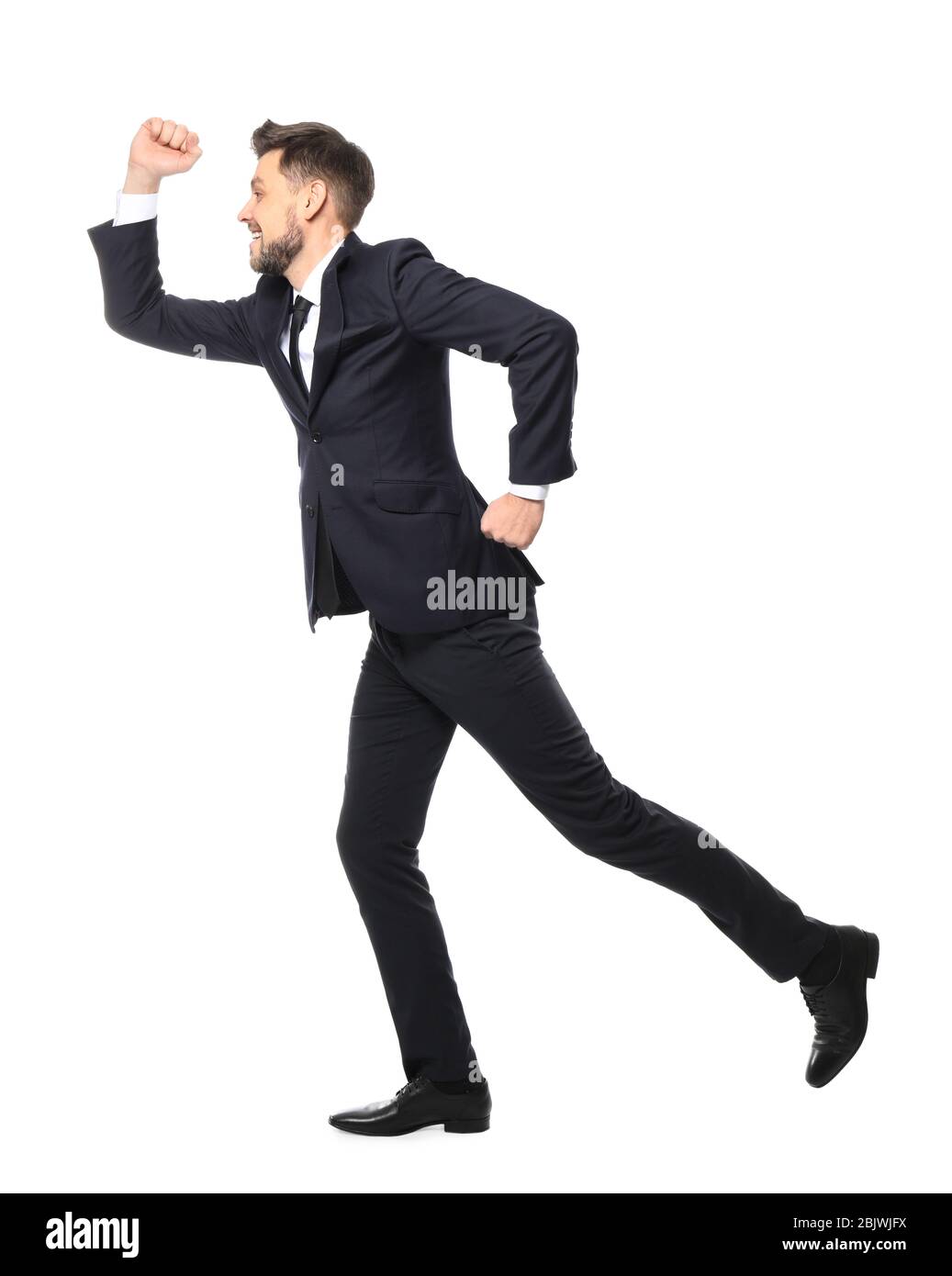 Young businessman running on white background Stock Photo - Alamy