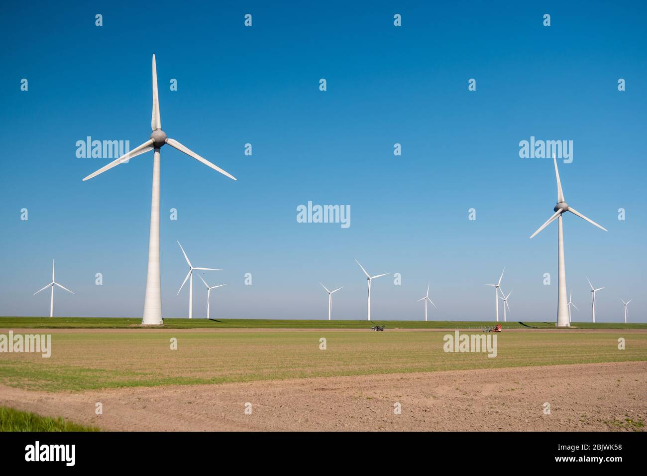offshore windmill park green energy in the Netherlands Europe, wind mill turbines at sea and