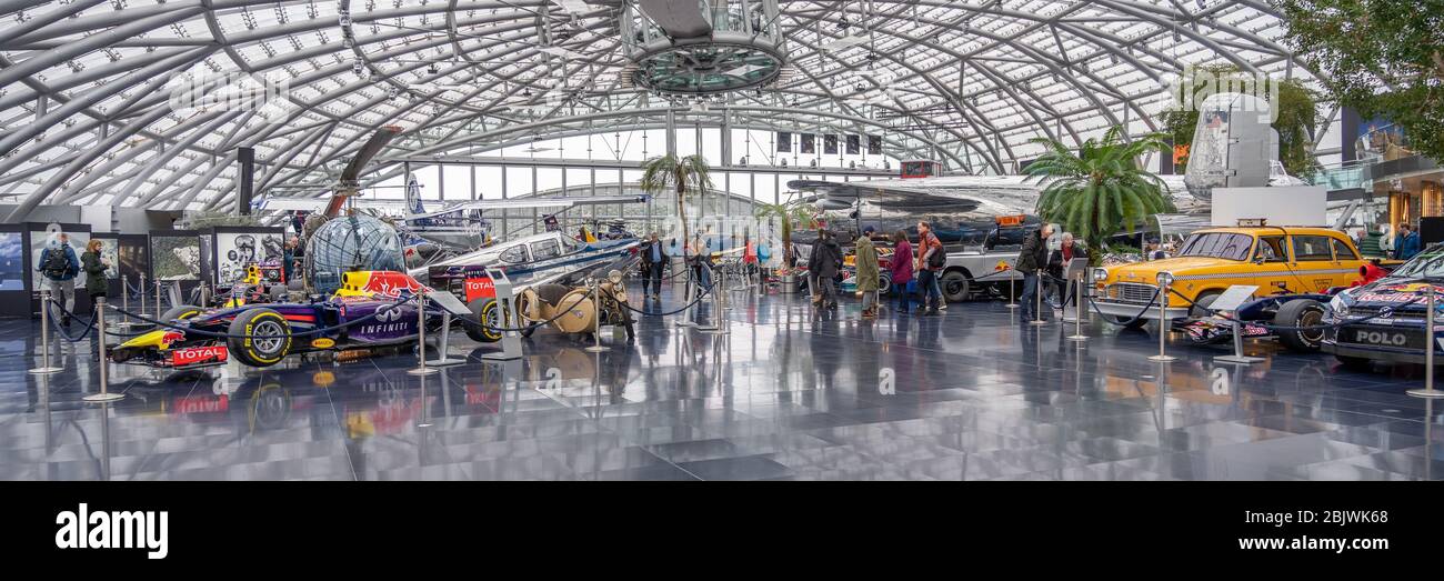 Feb 3, 2020 - Salzburg, Austria: Panoramic view of Hangar-7 Flying Bulls center hall with tourists visiting Stock Photo