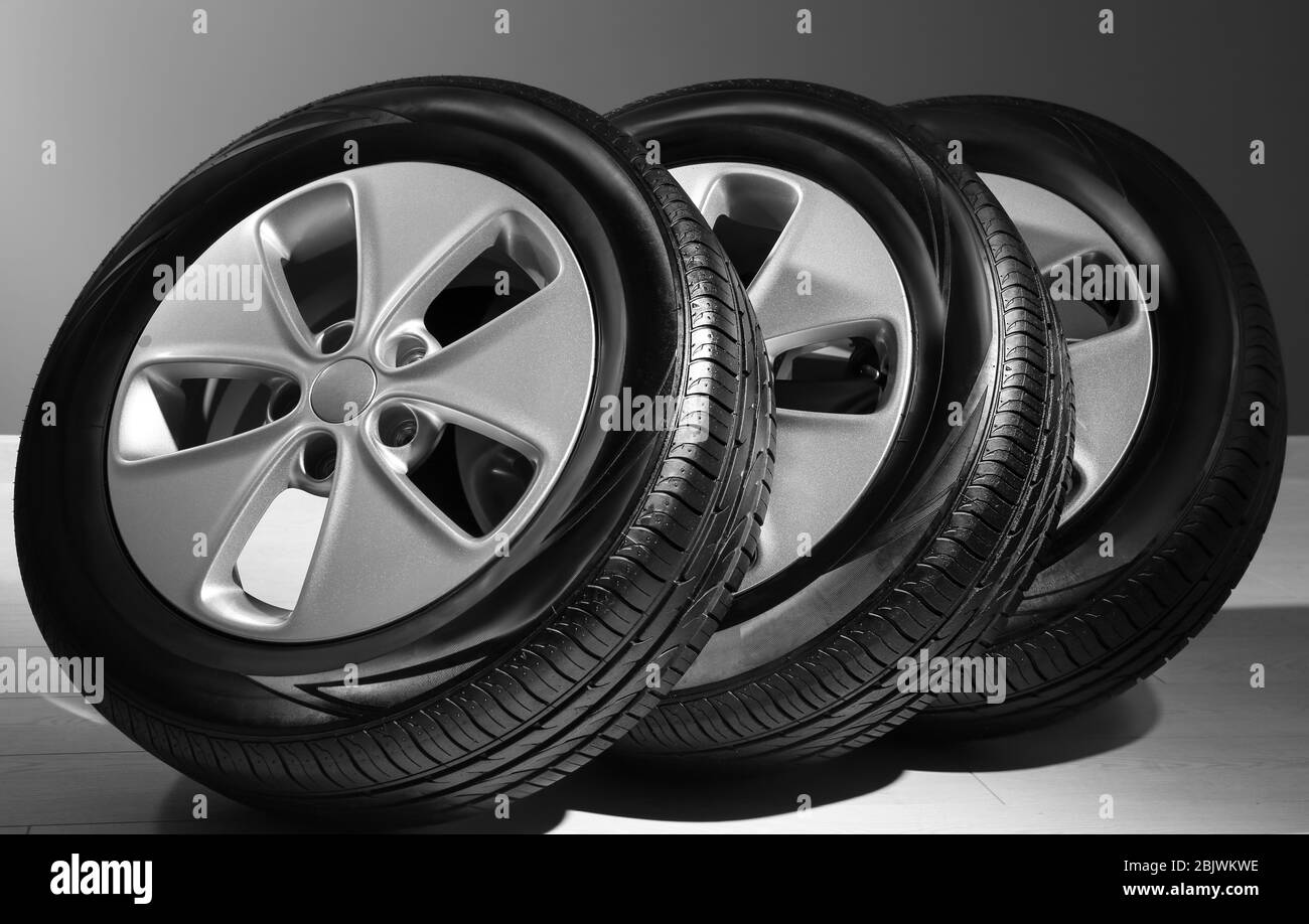 Car tires with rims indoors Stock Photo