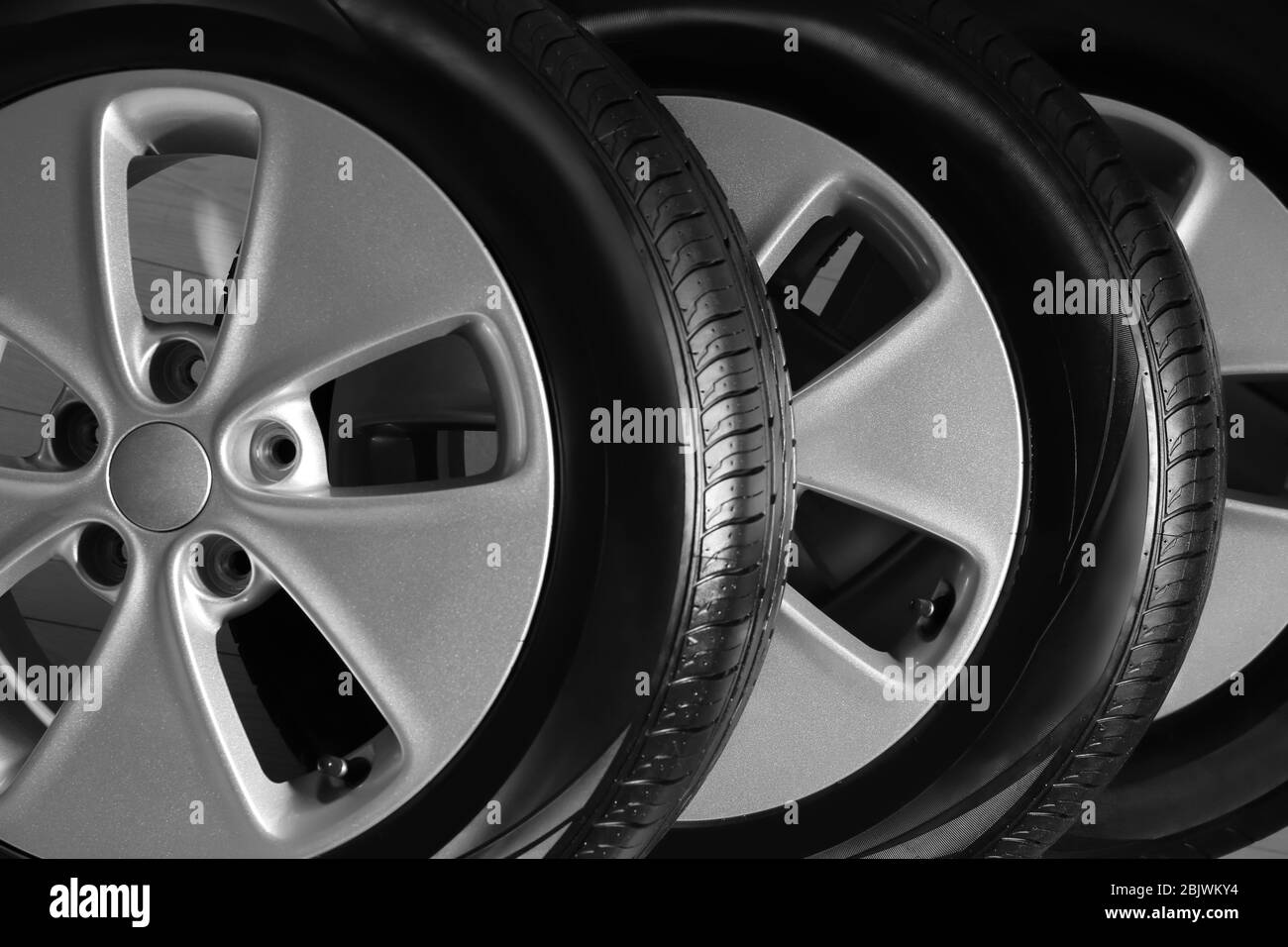 Car tires with rims, closeup Stock Photo