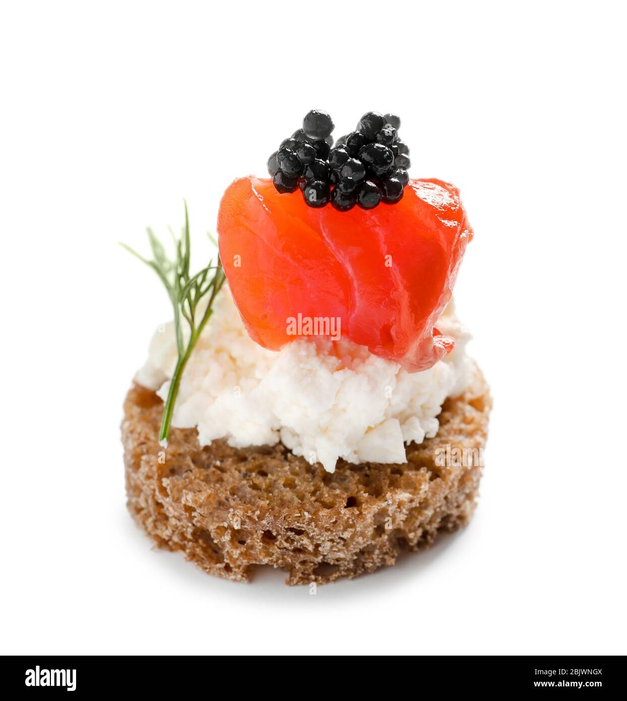 Delicious canape with black caviar on white background Stock Photo
