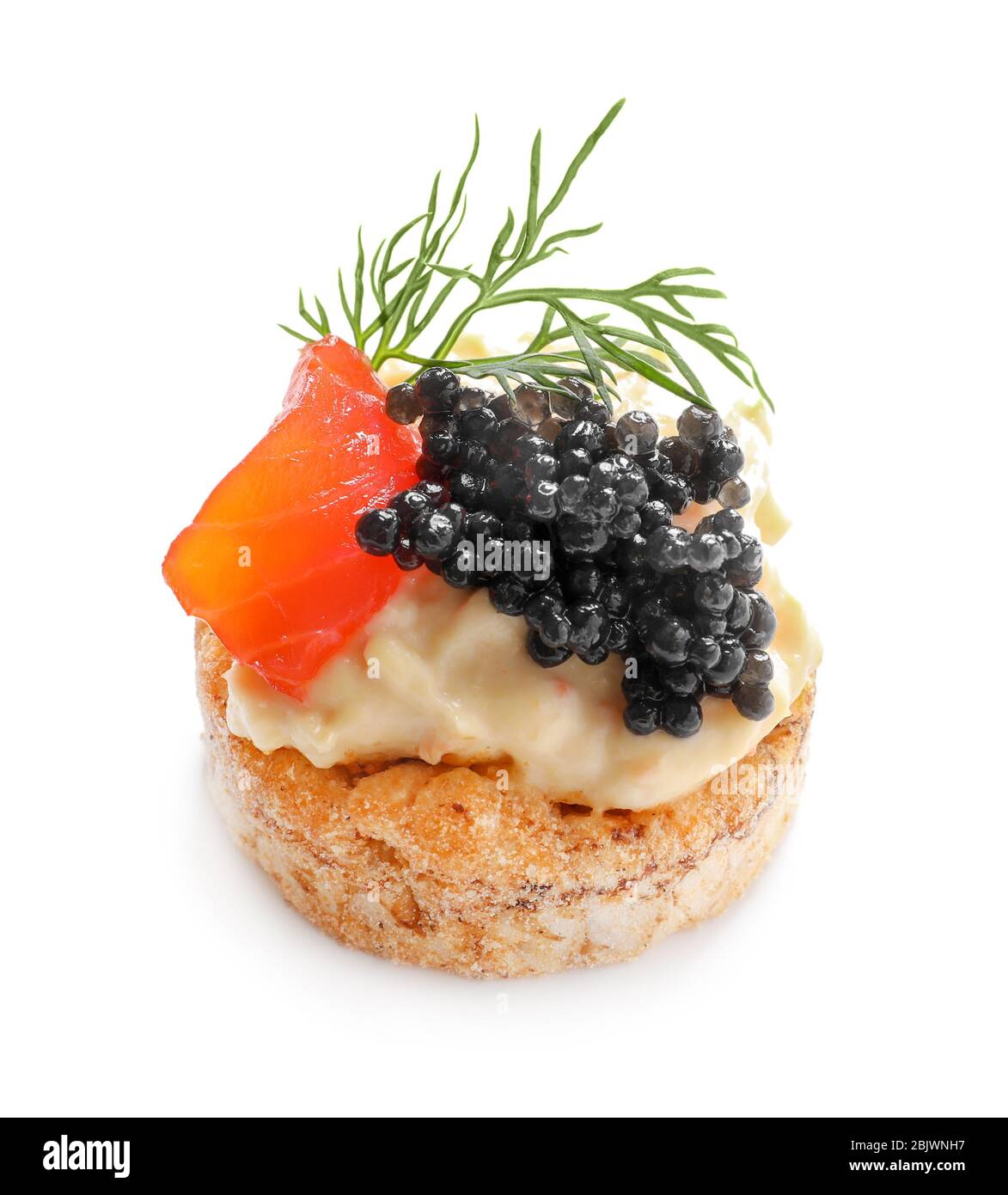 Delicious canape with black caviar on white background Stock Photo
