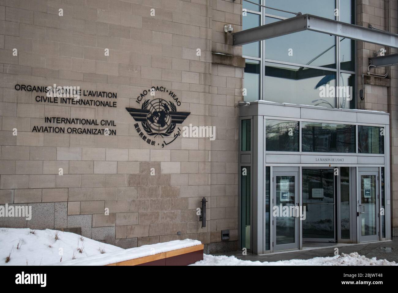The front entrance to the headquarters of the International Civil Aviation Organization (ICAO), offices at 999 Boulevard Robert-Bourassa in Montreal. Stock Photo