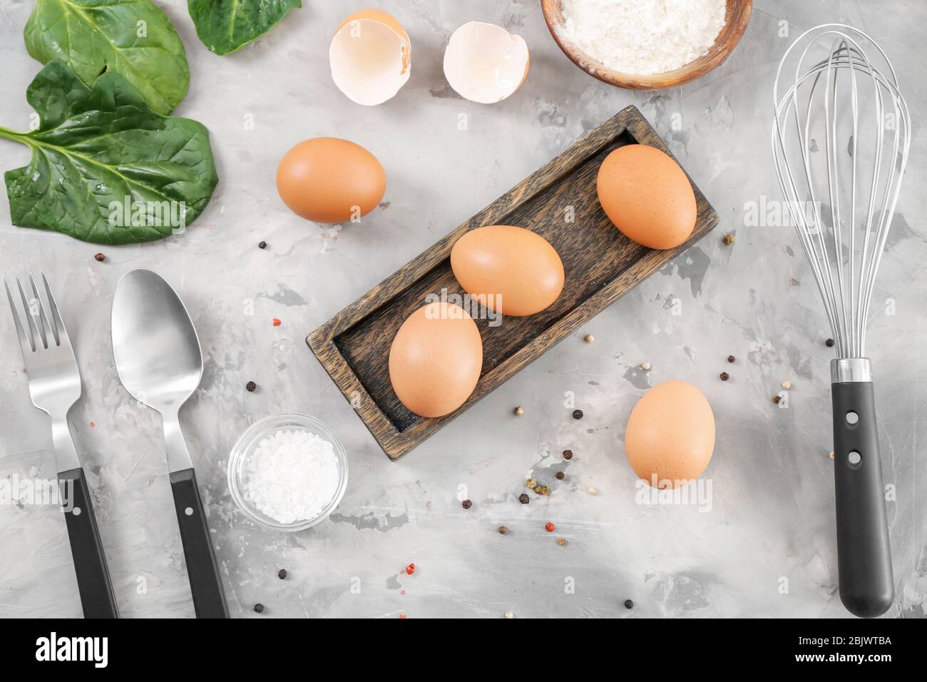 Composition with chicken eggs on table Stock Photo