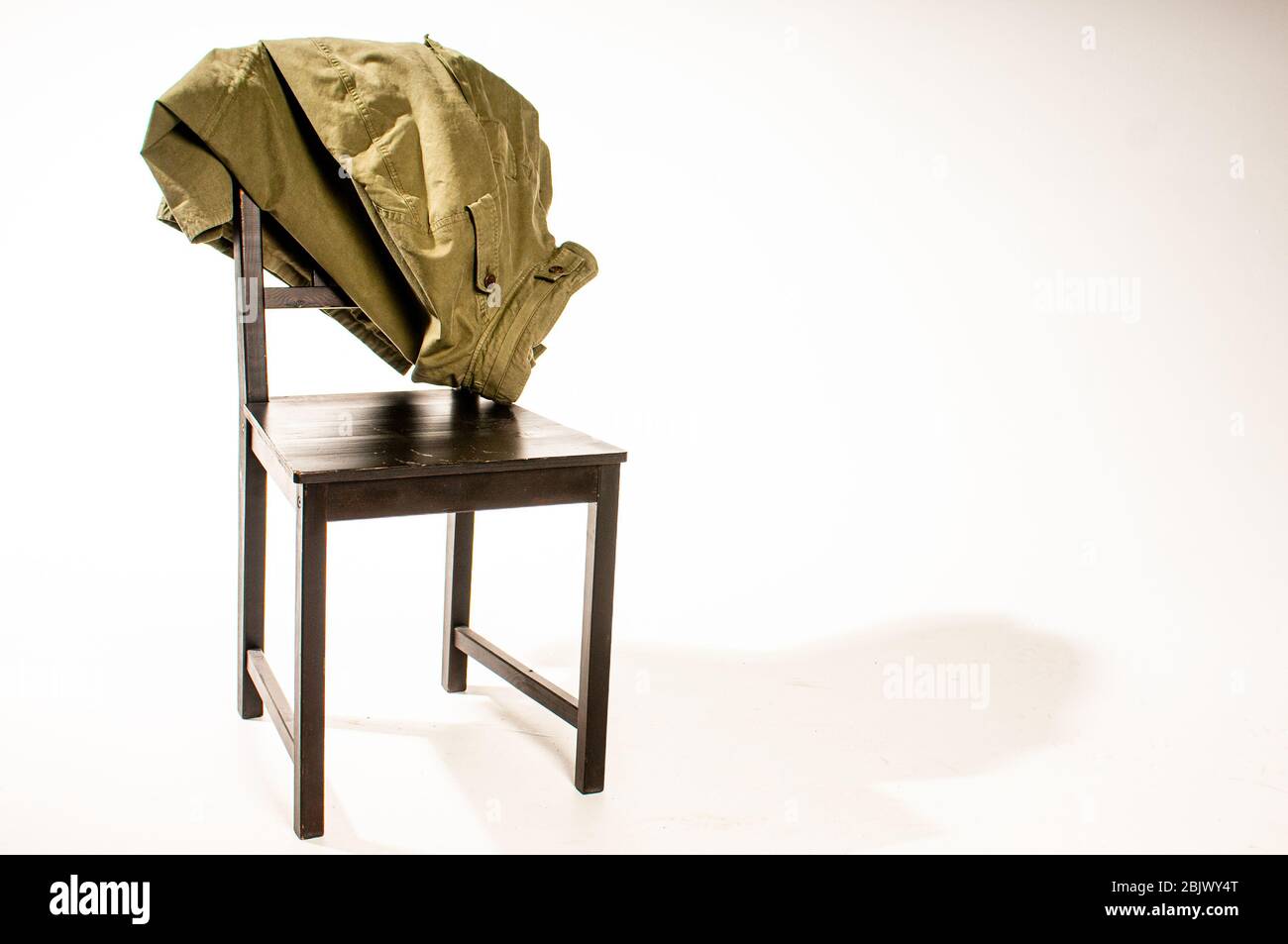 Clothes draped on chair hires stock photography and images Alamy