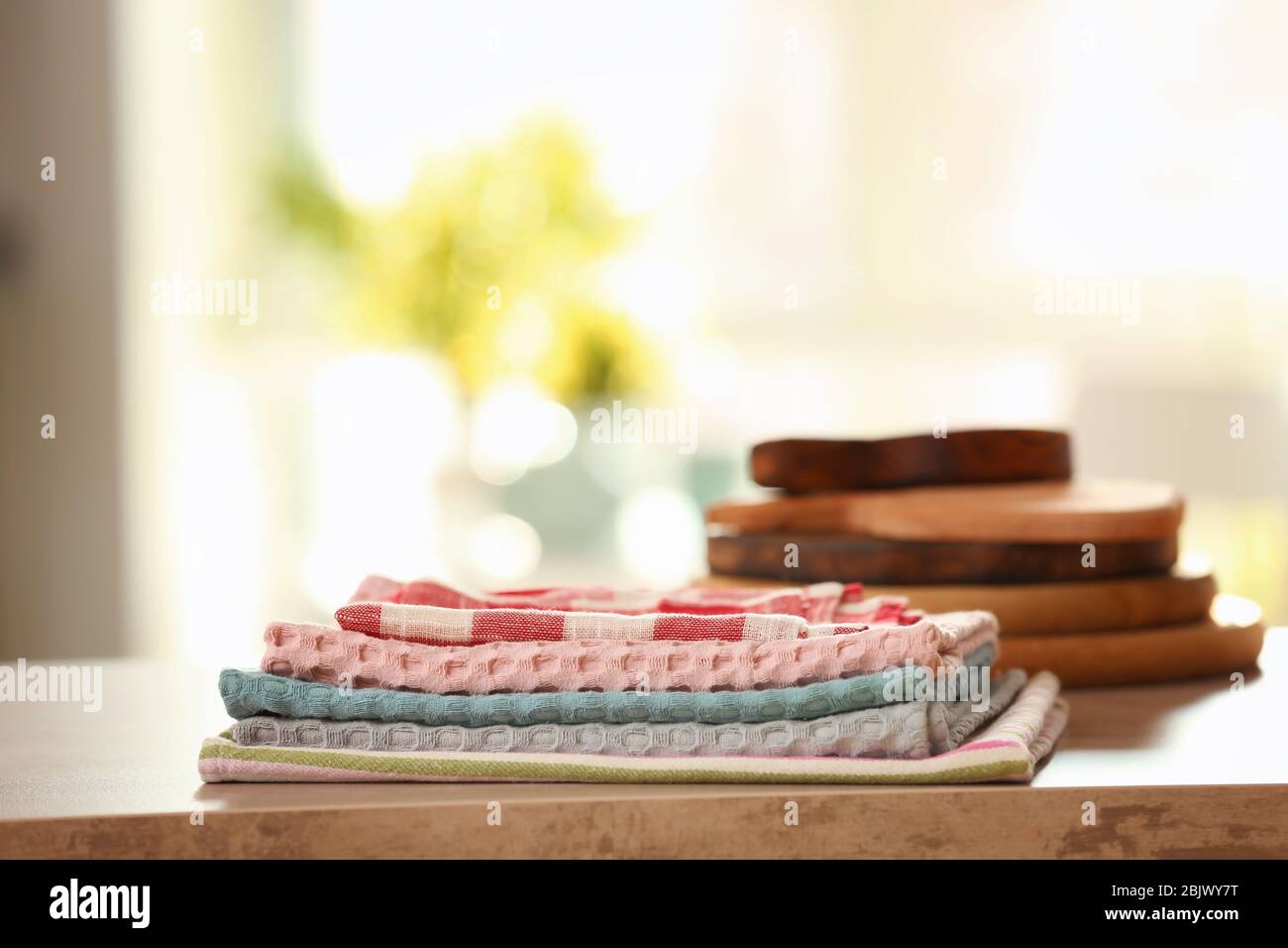 Clean kitchen towels on table Stock Photo Alamy