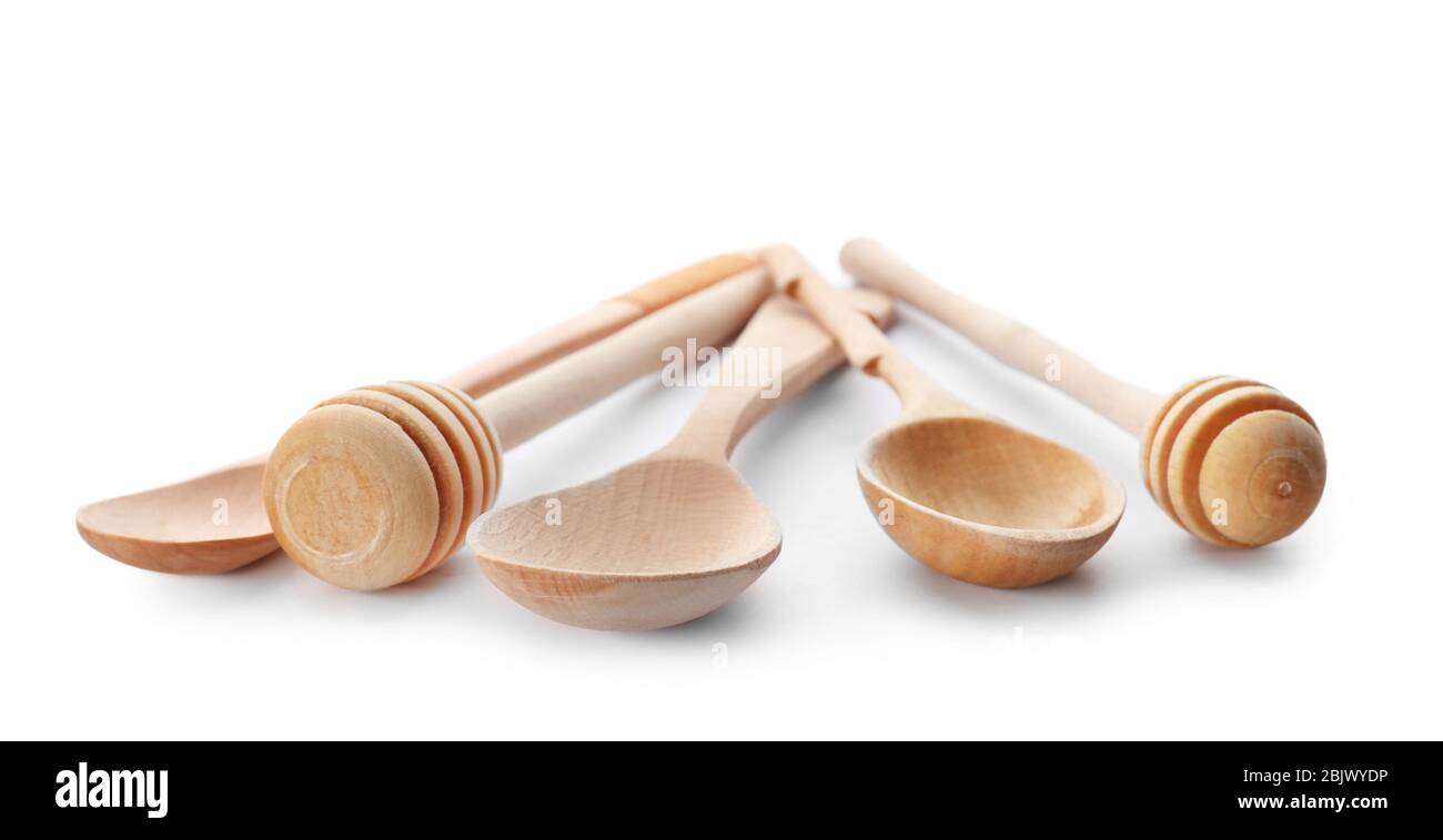 Wooden kitchen utensils on white background Stock Photo - Alamy