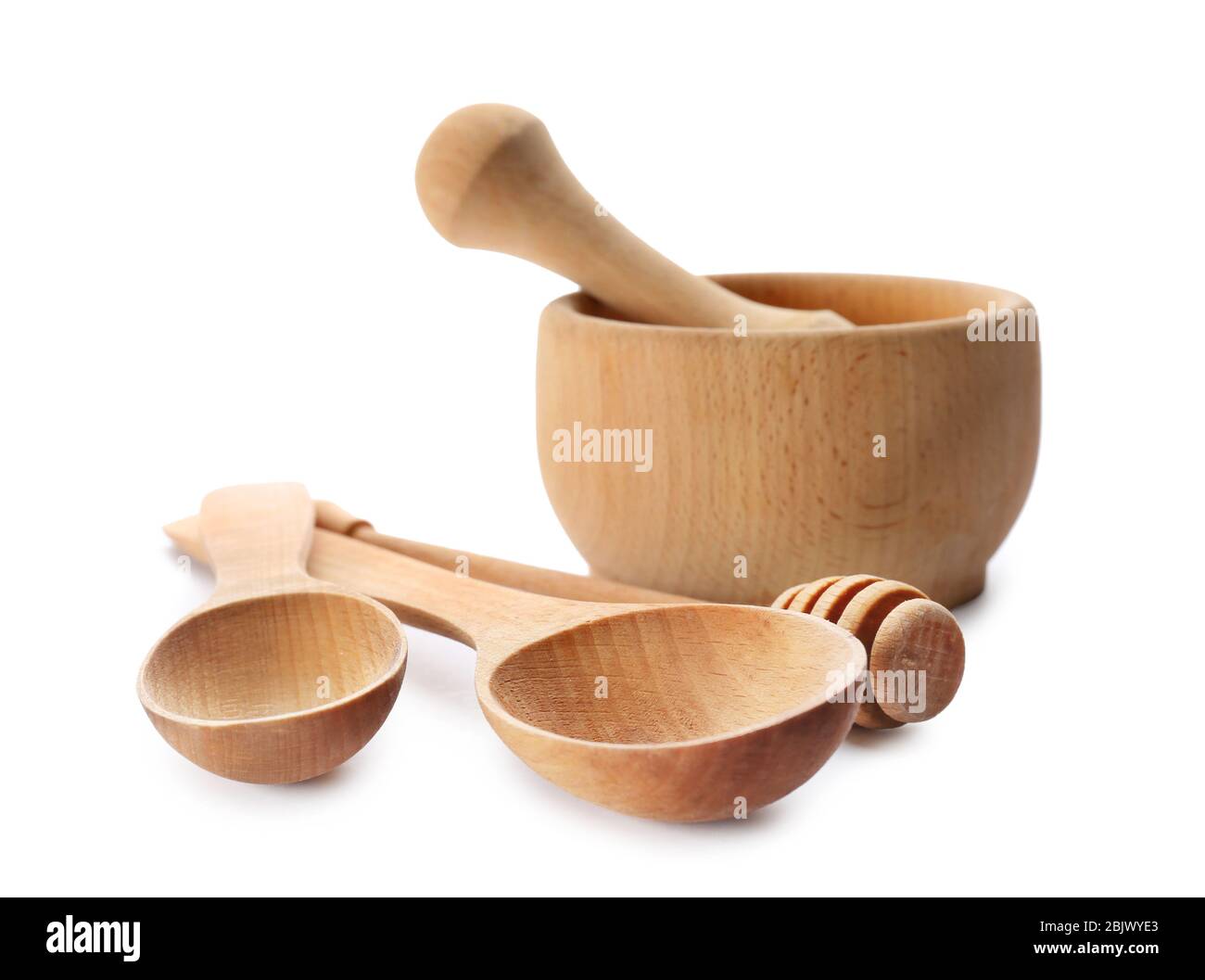 Wooden kitchen utensils on white background Stock Photo - Alamy