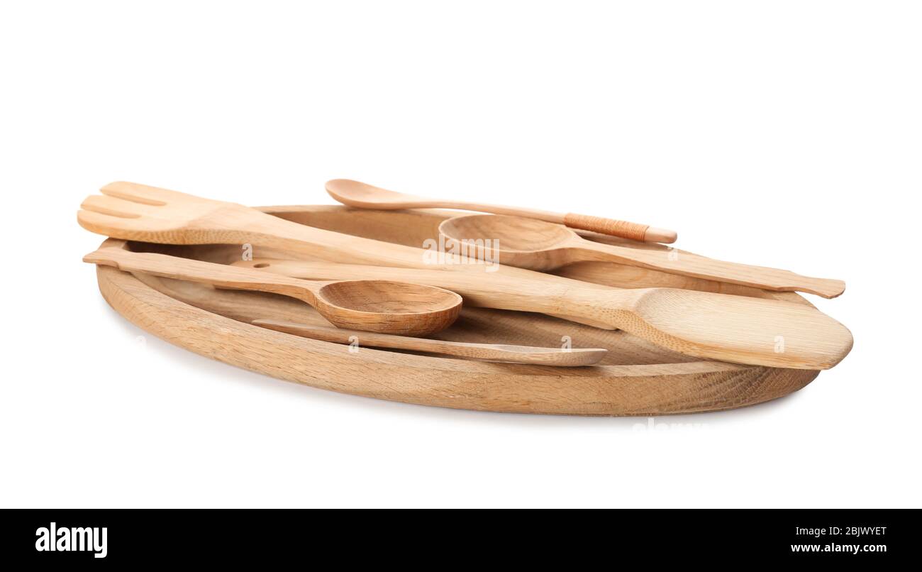 Wooden kitchen utensils on white background Stock Photo - Alamy