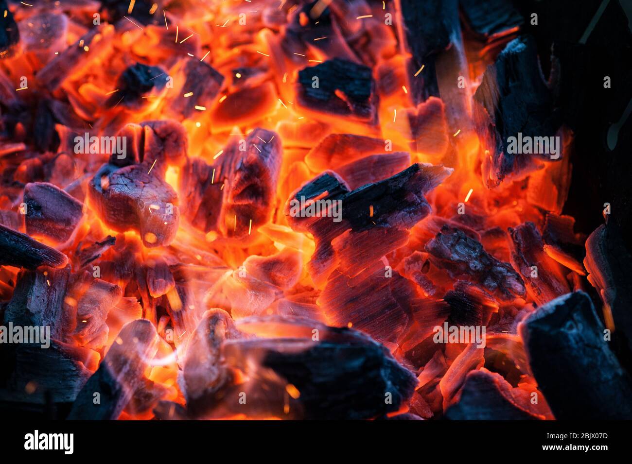Hot coals and barbecue fire. Background. Close Up, Copy Space Stock