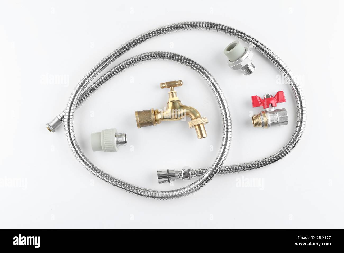Plumber's items on white background Stock Photo - Alamy