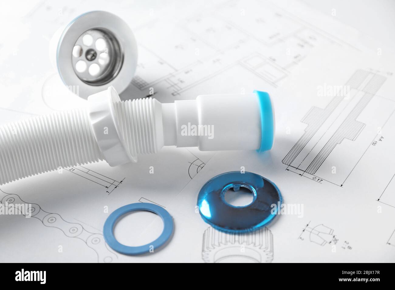 Plumber's items on drawing Stock Photo - Alamy