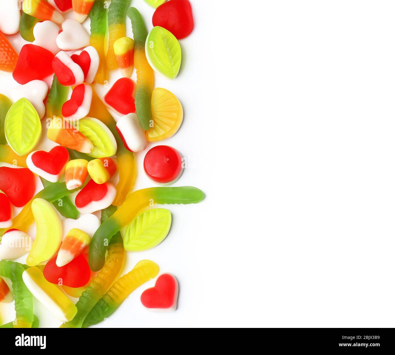 Different colorful jelly candies on white background Stock Photo - Alamy