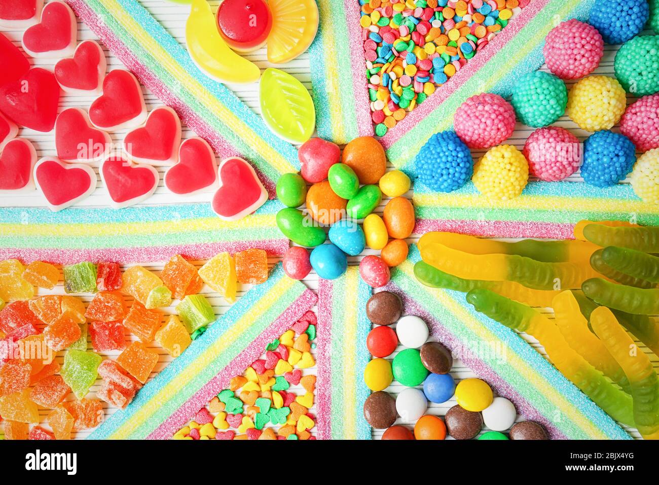 Colorful candies on light background Stock Photo
