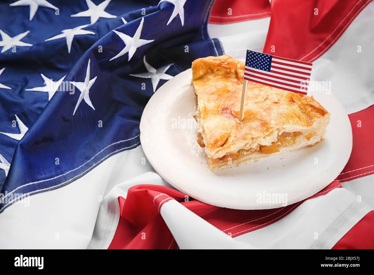 Piece of apple pie on American flag Stock Photo Alamy