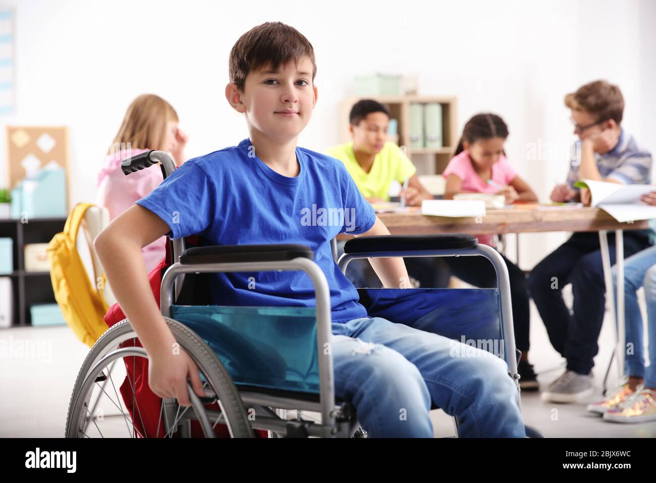 Boy in wheelchair at school Stock Photo Alamy