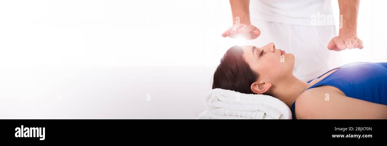 Reiki Energy Heal Treatment With Healing Hands Stock Photo