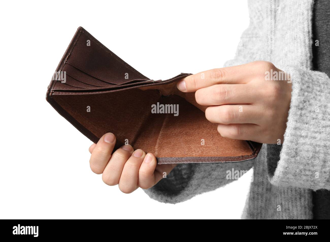 Empty purse in hands Stock Photo - Alamy