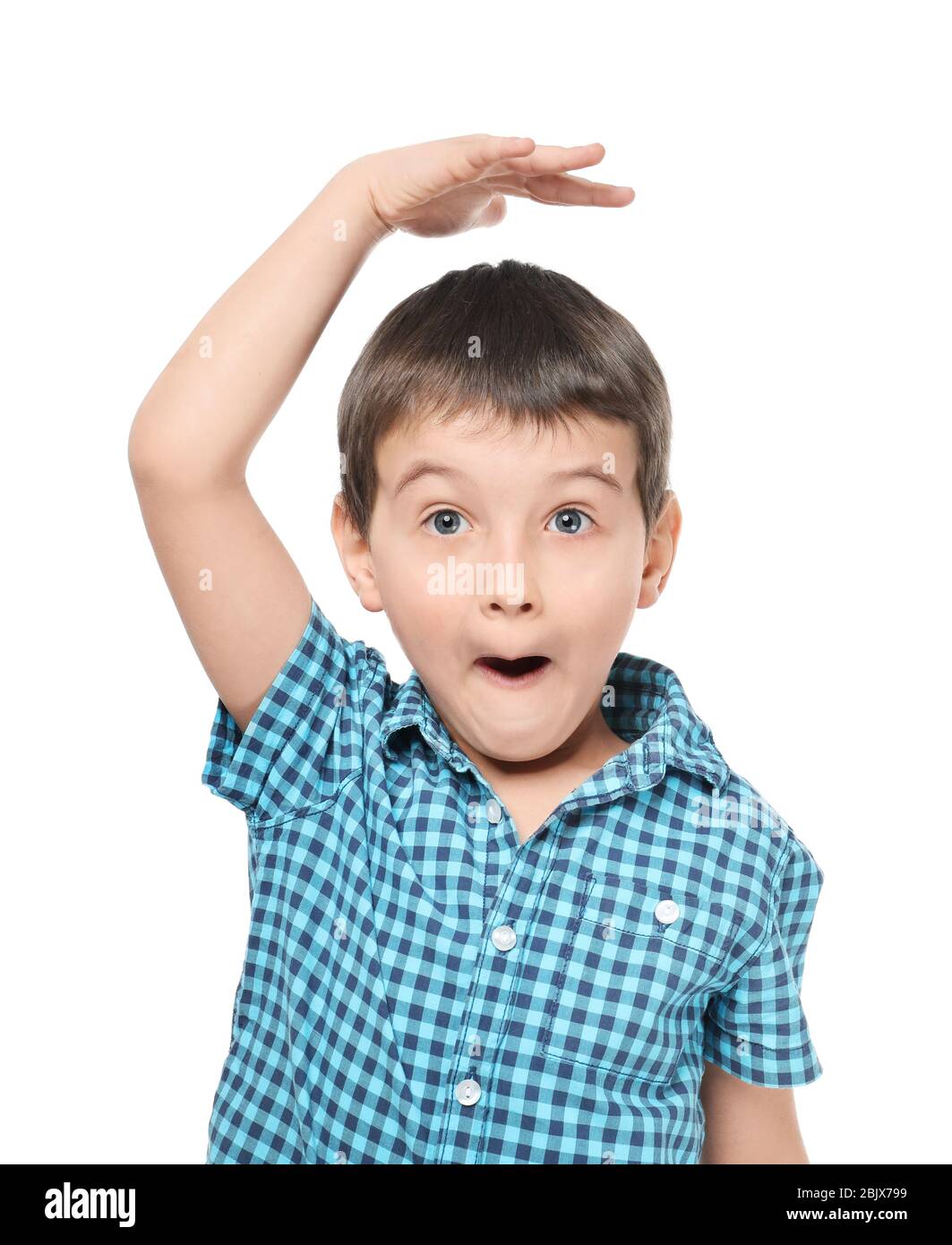 Little boy measuring height on white background Stock Photo