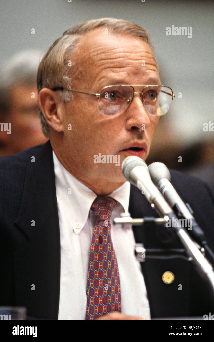 U.S. National Transportation Safety Board chairman James E. Hall testifies in Congress on the TWA Flight 800 airline explosion July 10, 1997 in Washington, DC. Stock Photo