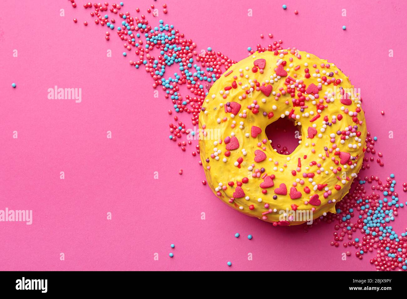 Download Delicious Yellow Donut On Color Background Stock Photo Alamy Yellowimages Mockups