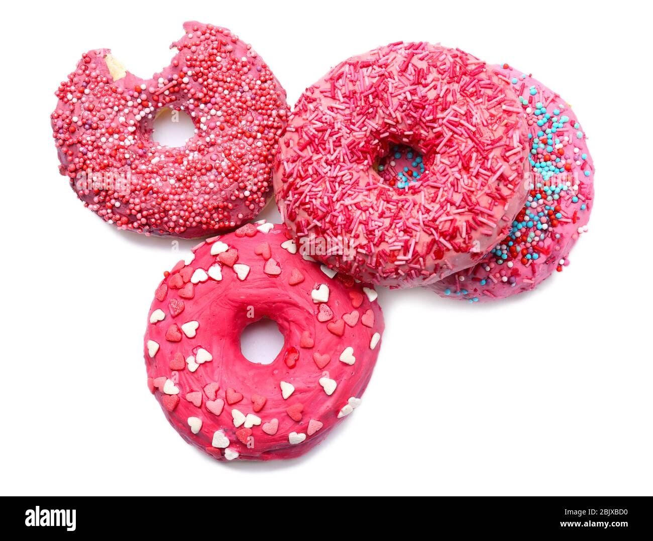 Delicious glazed doughnuts with sprinkles on white background Stock ...