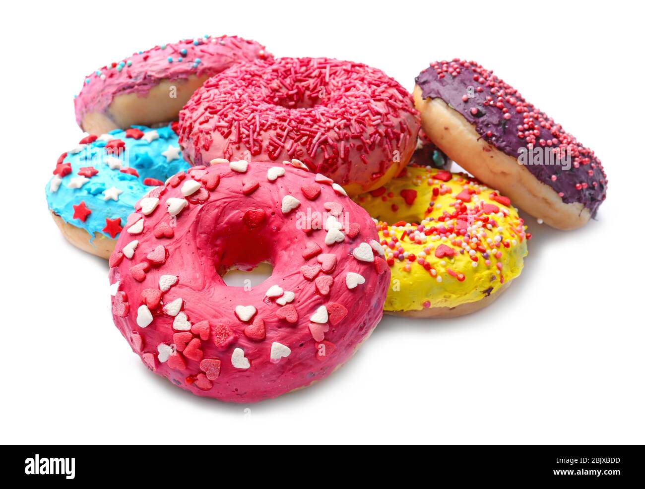 Delicious glazed doughnuts with sprinkles on white background Stock ...