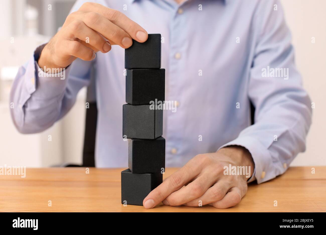 Hands growth building blocks hi-res stock photography and images - Alamy