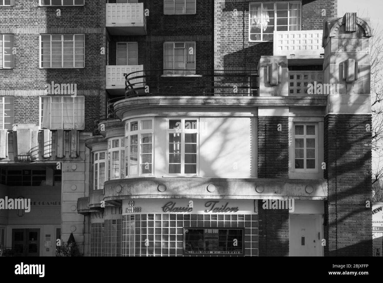 1930s Architecture Apartment Block Flats Red Brick Balconies Art Deco The Grampians, Shepherds Bush Road, London W6 Collcutt & Hamp Maurice Webb B&W Stock Photo