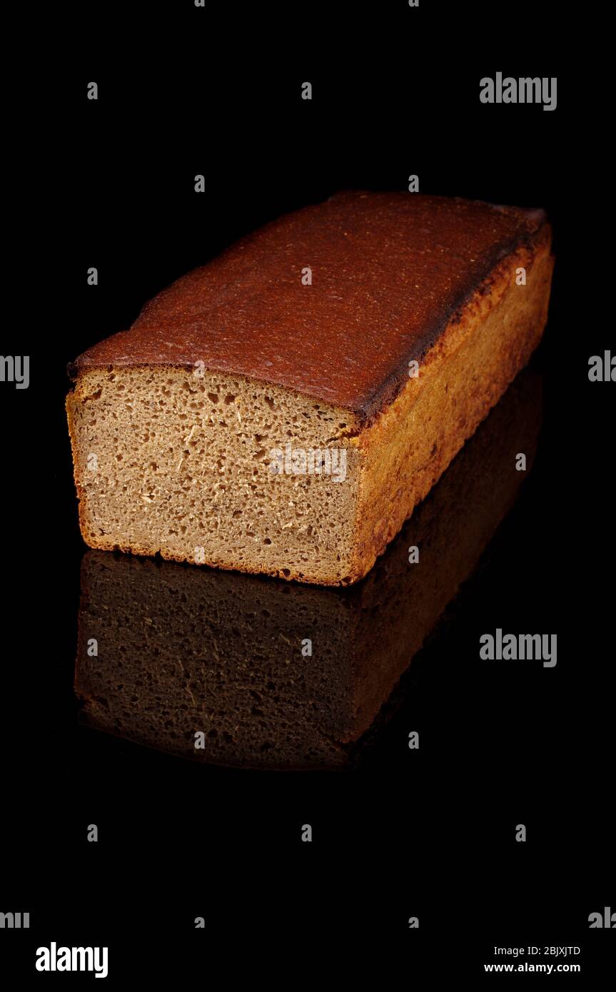 Traditional lithuanian rye bread (dark bread) loaf isolated on the