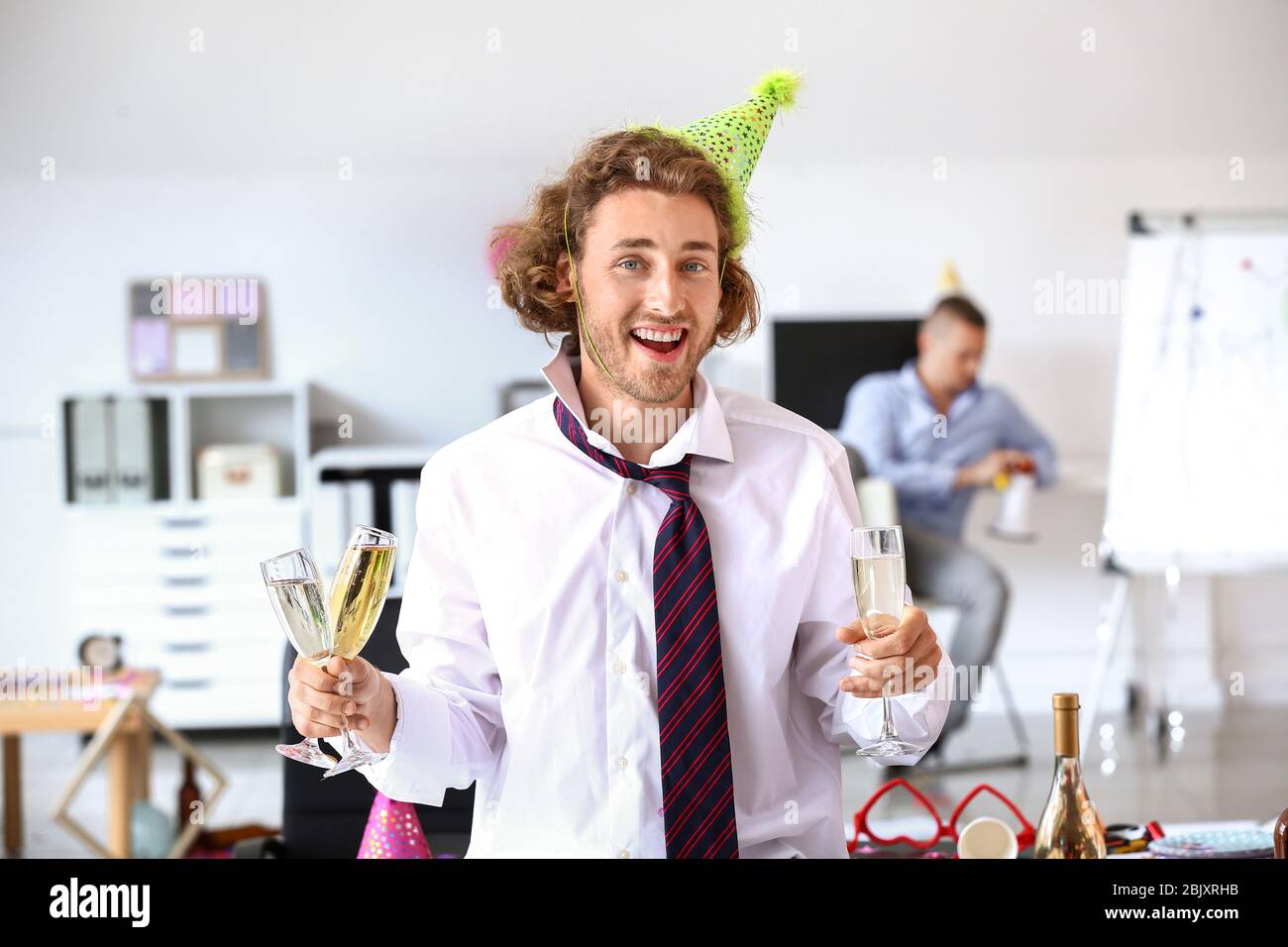 Drunk man at office party hi-res stock photography and images - Alamy