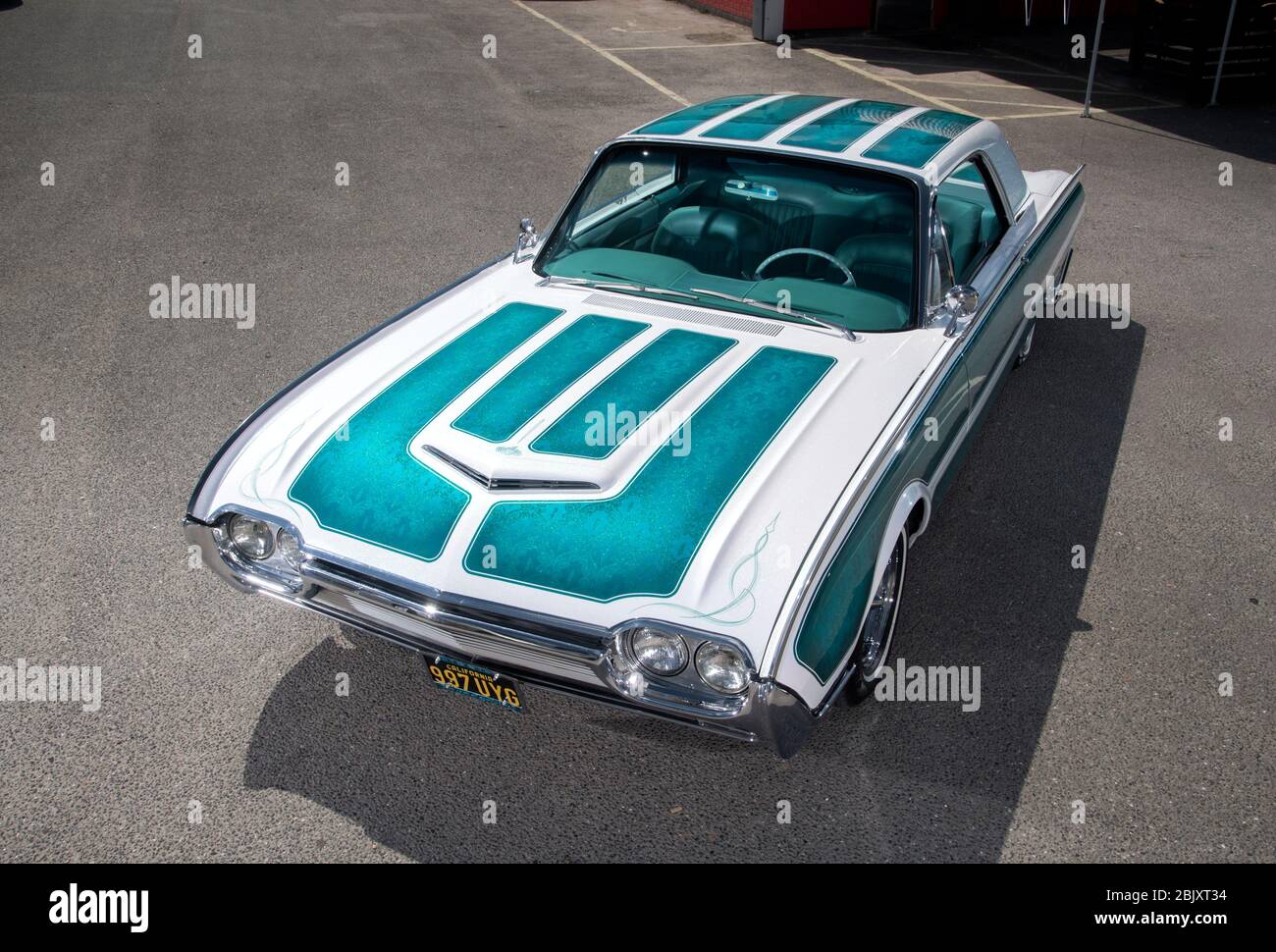 Ford Thunderbird low rider with LA Gang style girl Stock Photo