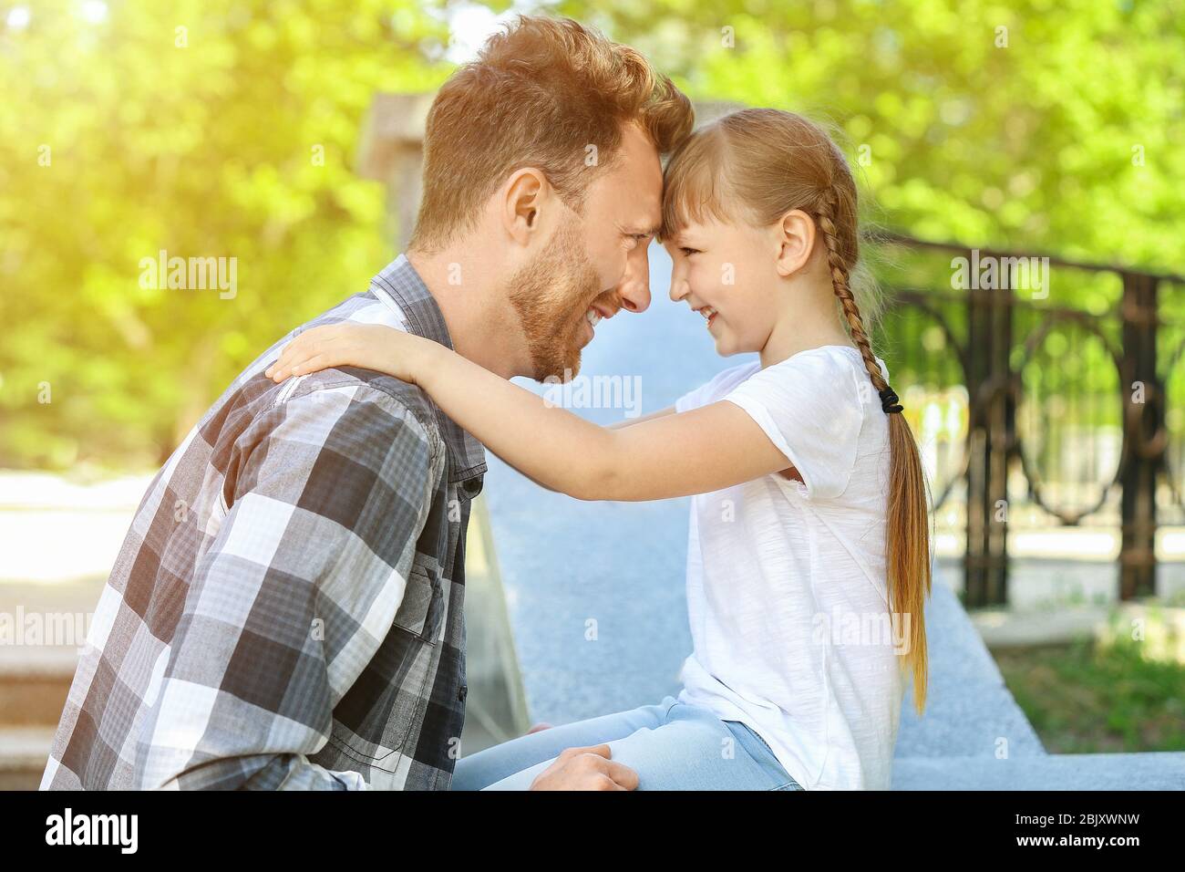 Portrait of happy father and his little daughter outdoors Stock Photo ...