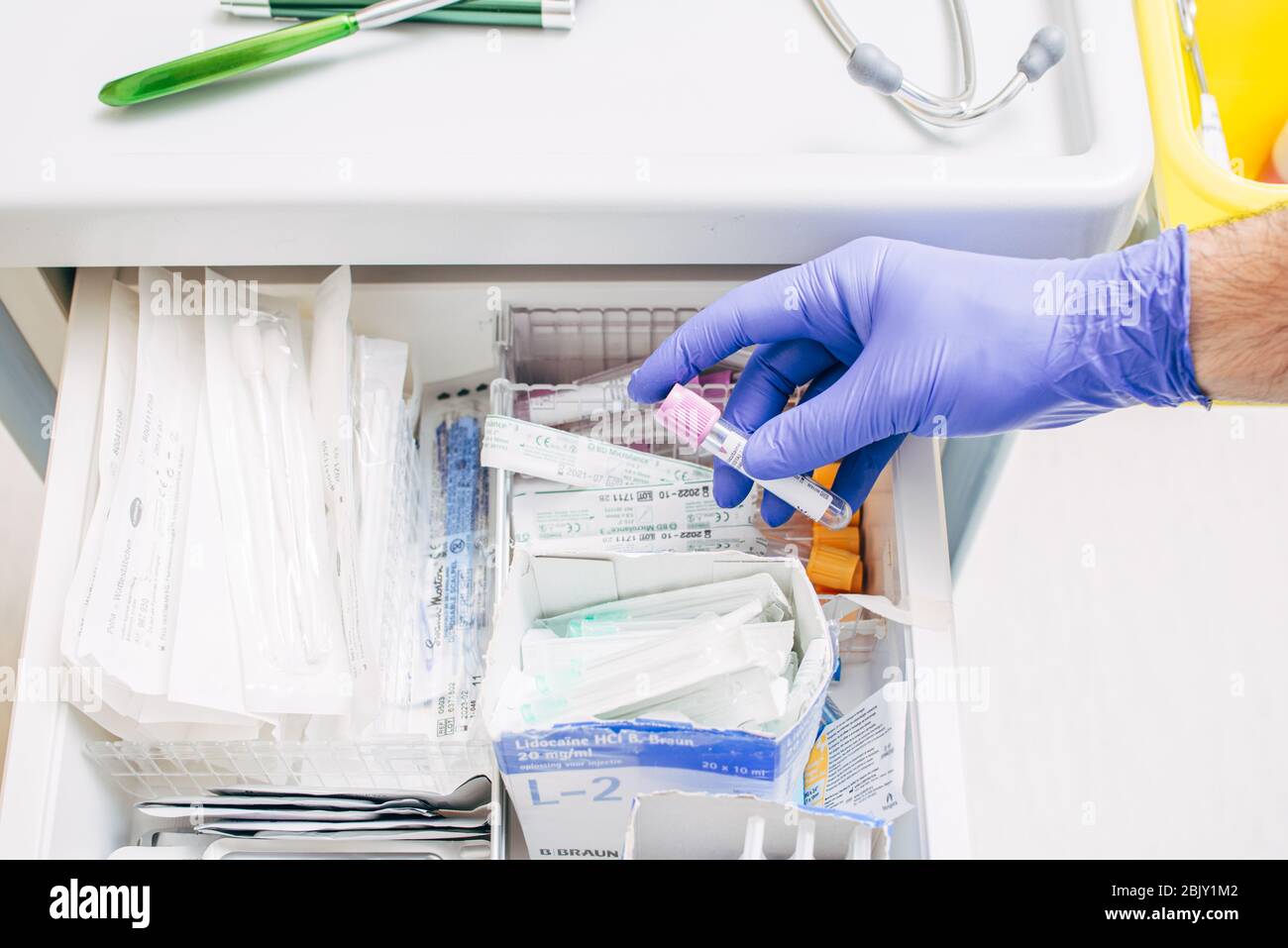 Laboratory research. Scientist with test tube making research in clinical laboratory. Stock Photo
