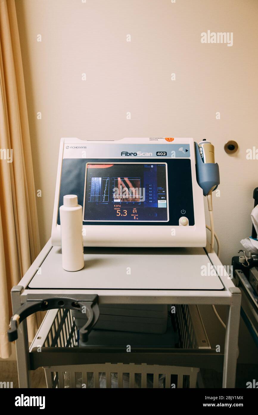 Close-up of Specialized Ultrasound Machine in Hospital. Modern clinic with high technology equipment. Health care, diagnostic and disease prevention c Stock Photo