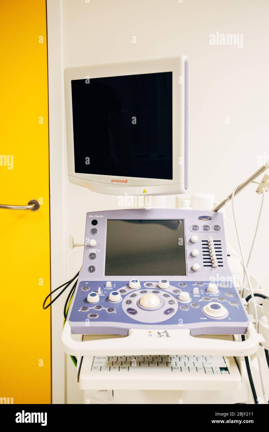 Close-up of EKG and Ultrasound machine in hospital. Modern clinic with high technology equipment. Health care, diagnostic and disease prevention conce Stock Photo