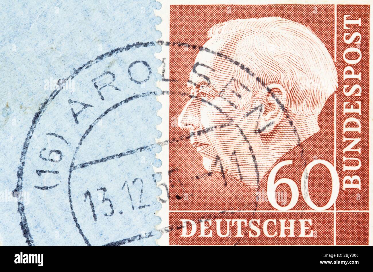 SEATTLE WASHINGTON - April 30, 2020: 1954 Germany stamp featuring portrait of former president Theordore Heuss in profile, on blue air mail envelope. Stock Photo